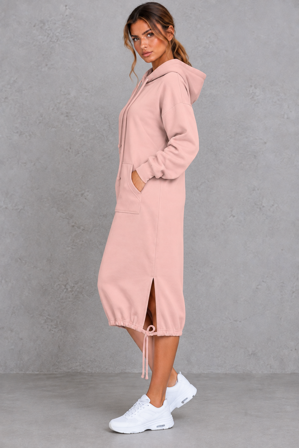 Women's hoodie midi dress shown in a relaxed loose fit with long sleeves