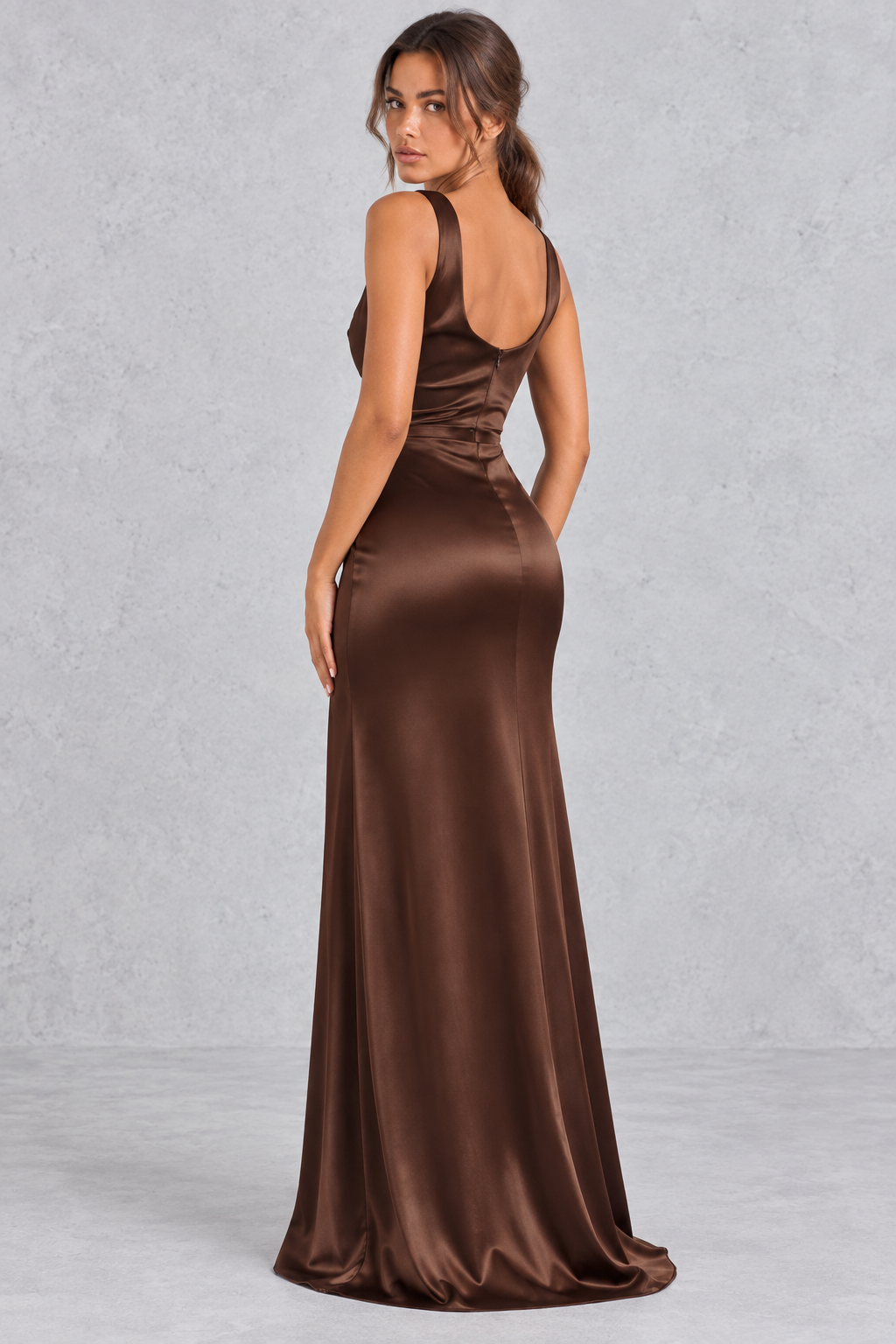 Back view of a sleeveless V-neck maxi dress showing the streamlined silhouette.