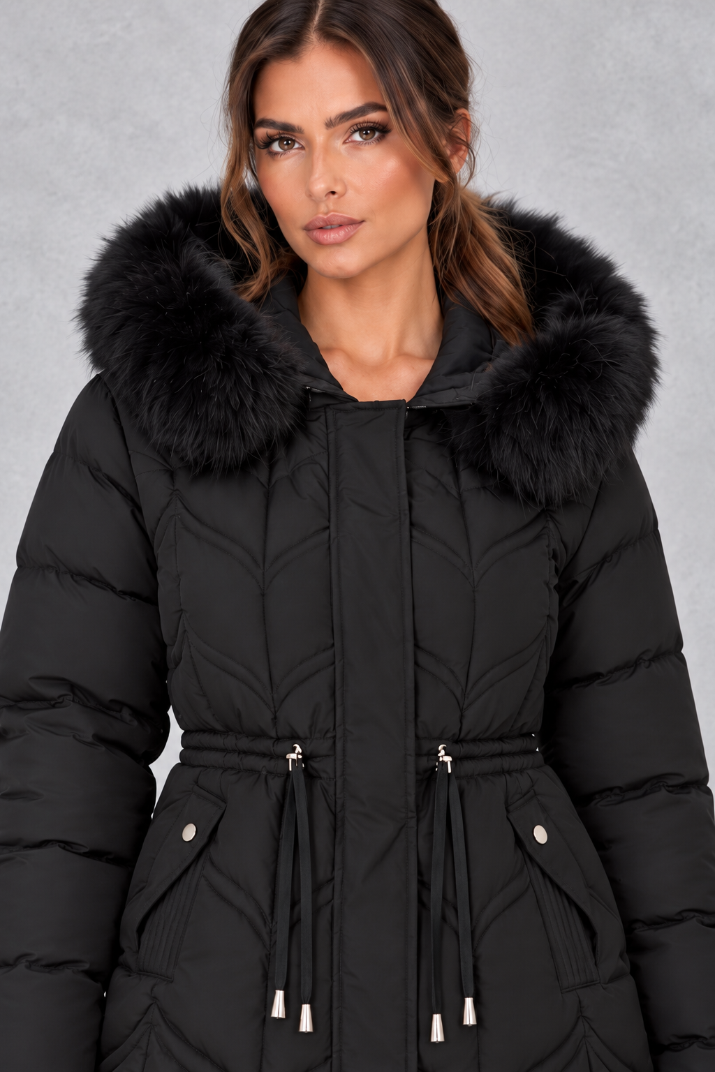 Close-up of faux fur-trimmed hood and quilted padding