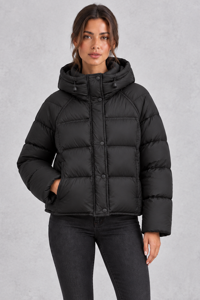 Hooded puffer jacket styled with jeans and chunky boots
