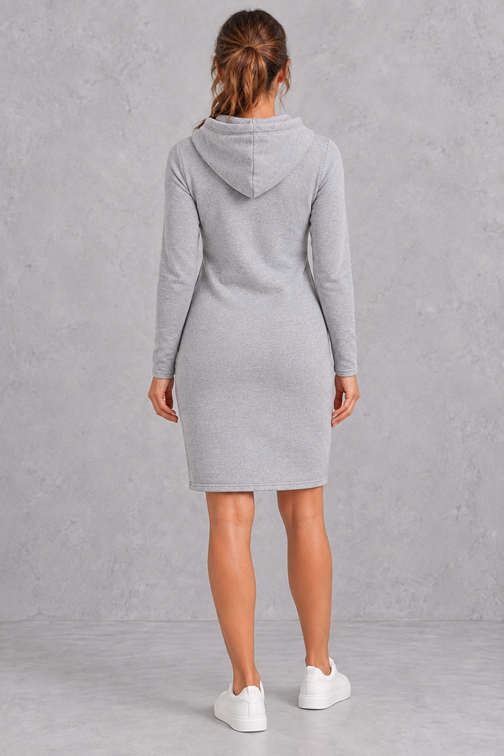 Close-up of the front kangaroo pocket on the hoodie dress