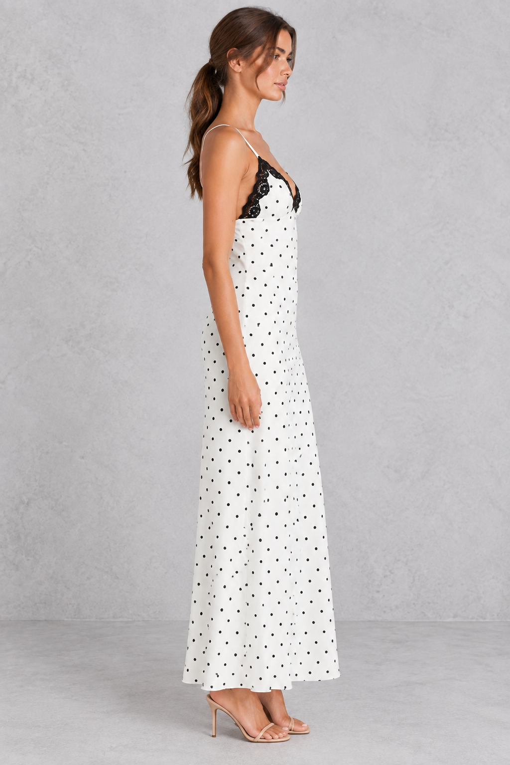 Strappy lace maxi dress with high waist, perfect for evening events.