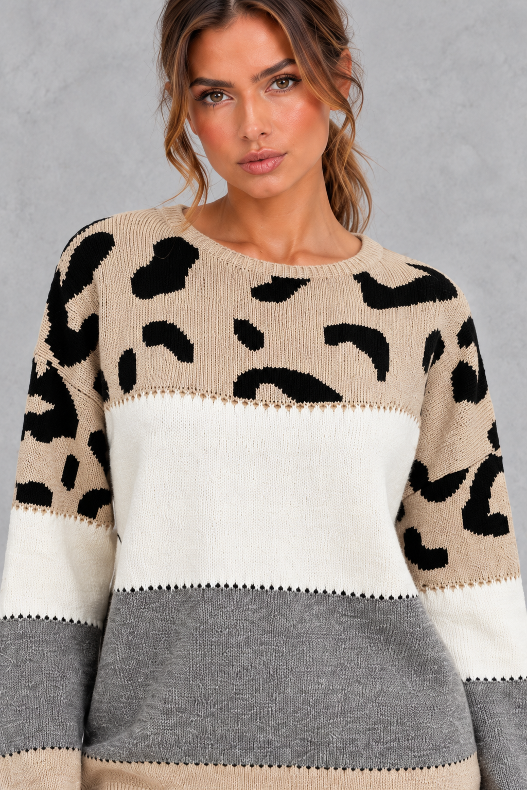 Close-up of leopard knit pattern and neutral color-block panel