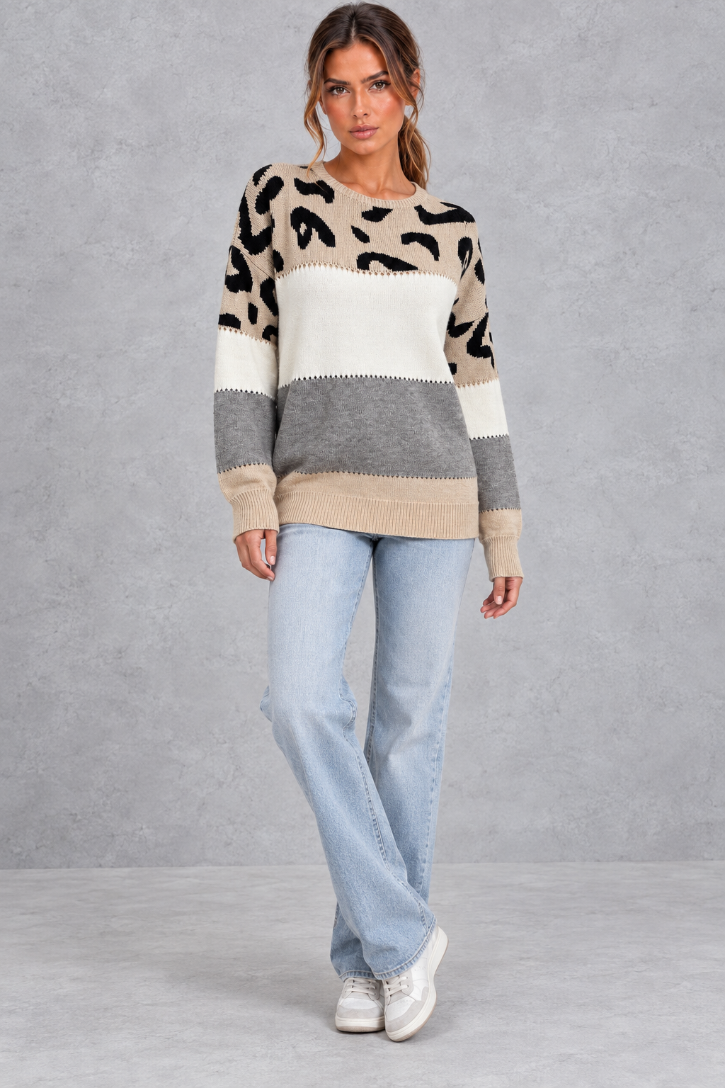 Back view of relaxed beige leopard print sweater