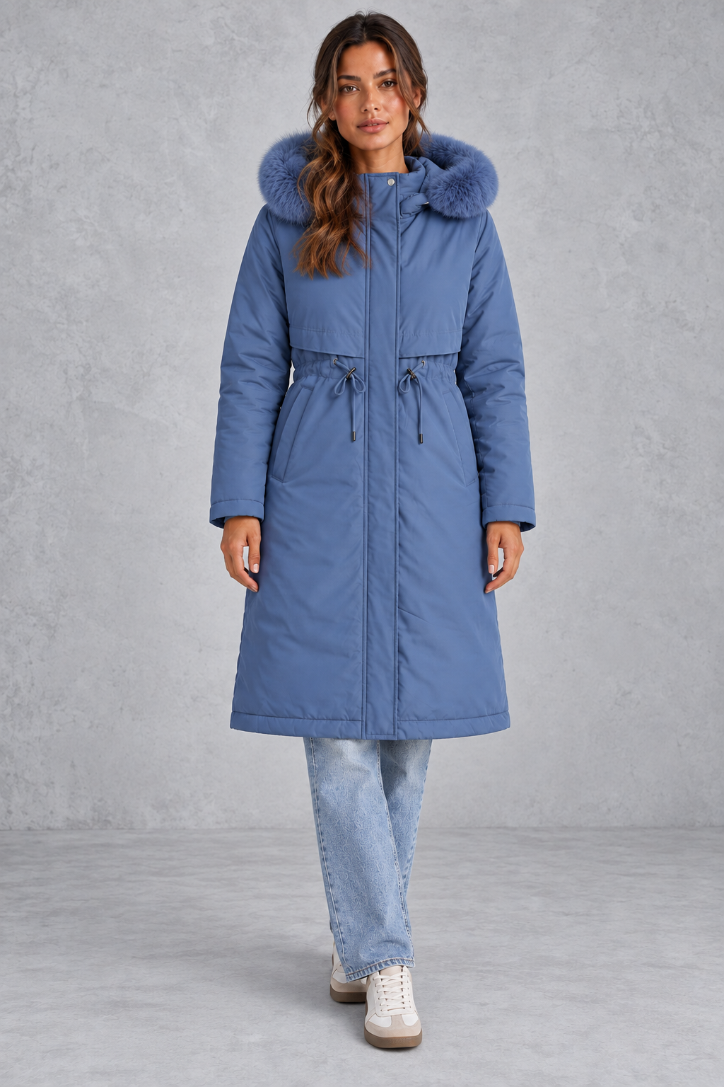 Back view of a women's long hooded winter parka with faux fur trim