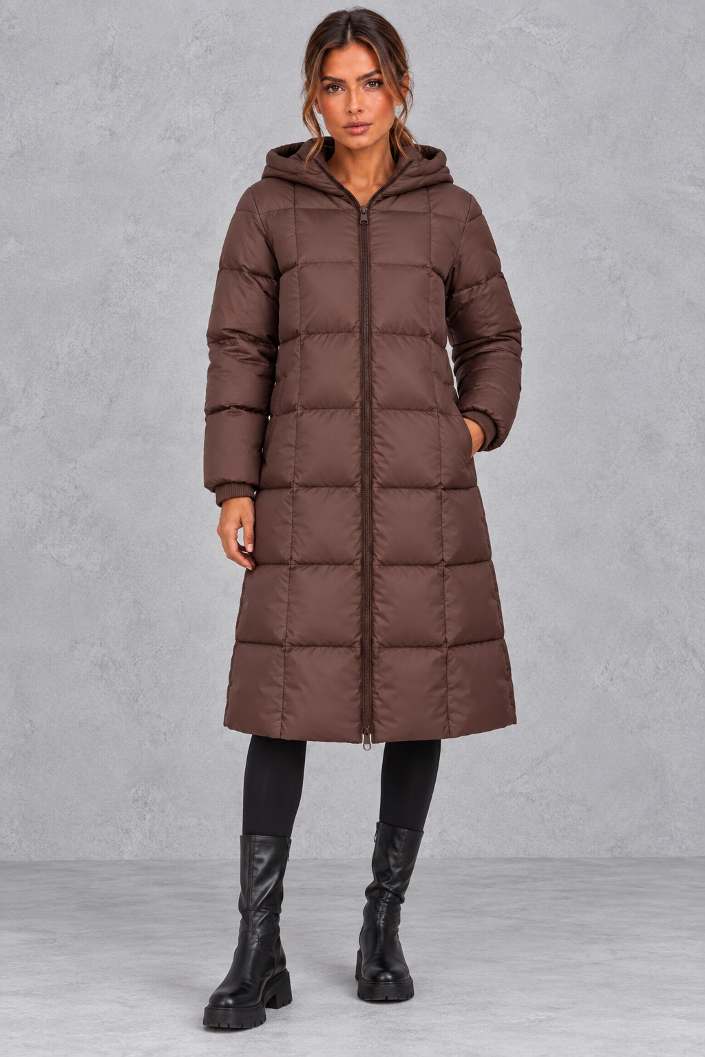 Women's longline hooded puffer coat with high neck, front view