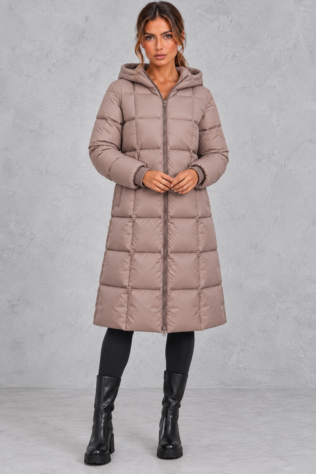 Long puffer coat styled with jeans and winter boots