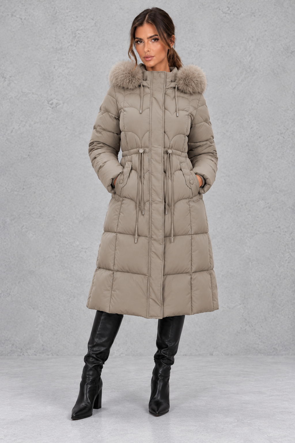 Women's longline puffer coat with faux fur hood trim, front view