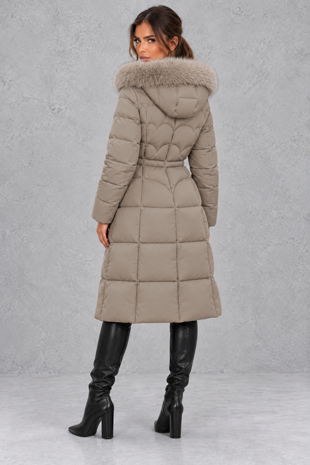 Longline puffer coat styled with drawstring waist cinched