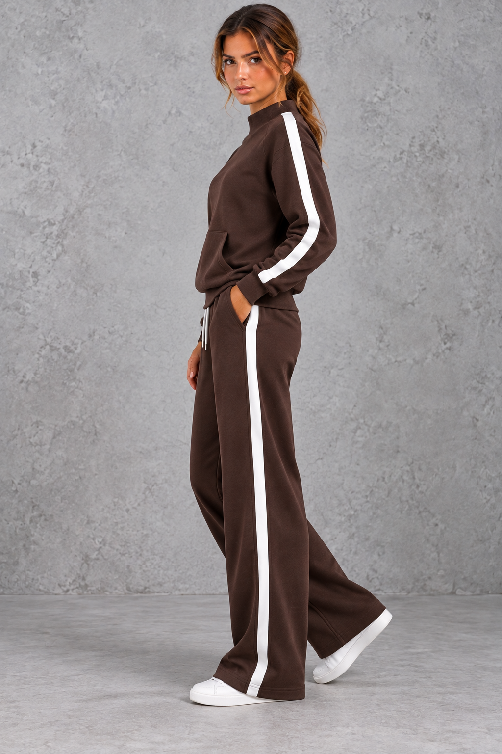 Back view of the mock neck sweatshirt and high-waisted pants
