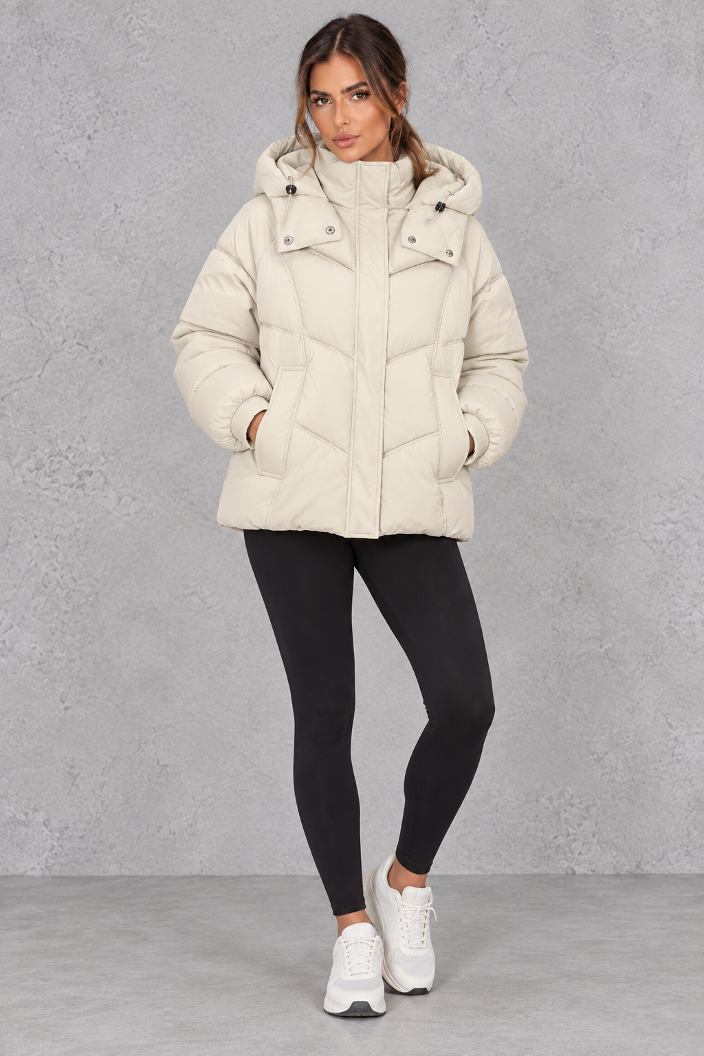 Quilted puffer jacket in cream styled with jeans