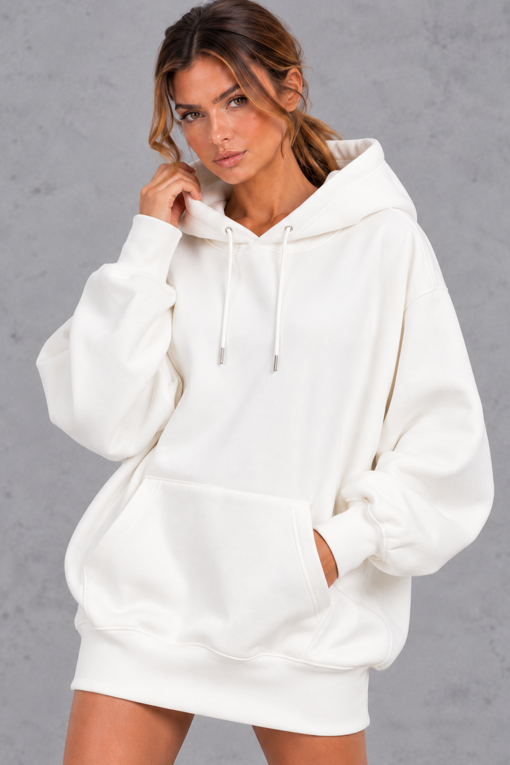 Close-up of balloon sleeve gathered into a ribbed cuff on a women's hoodie dress