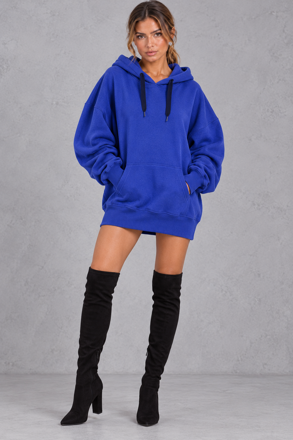 Deep ribbed hem band detail on a women's oversized hoodie mini dress