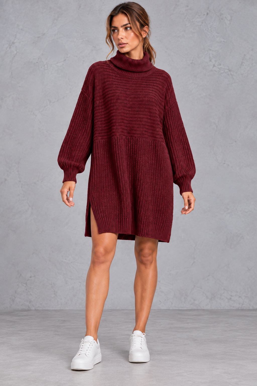 Women's plus size knit dress layered under a long coat