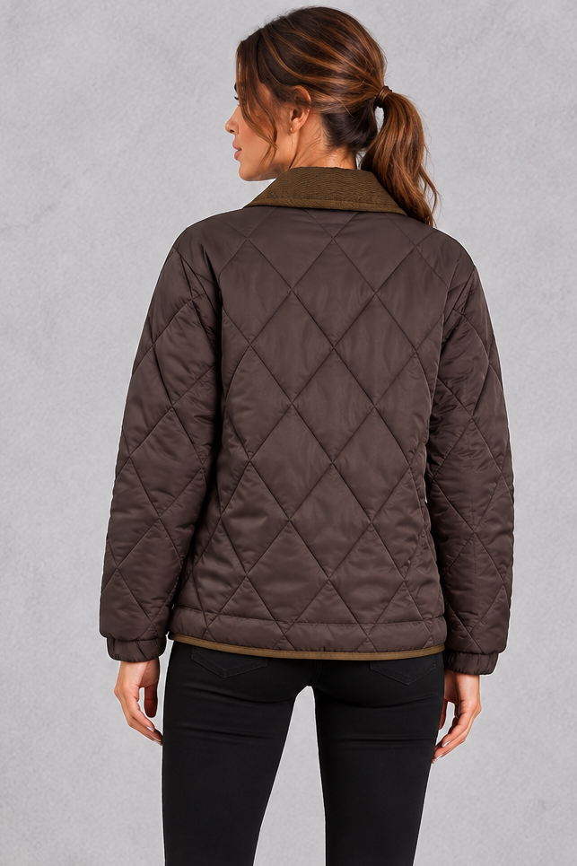 Detail of the front patch pocket with buttoned tab