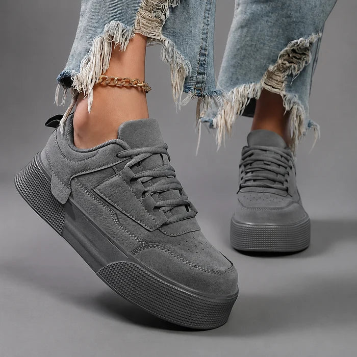 Women’s round toe lace-up sneakers with a lightweight low-top design, cushioned insole, breathable construction, and flexible durable outsole.