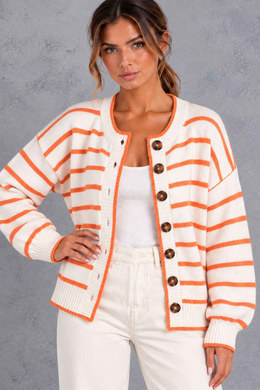 Women's striped cardigan in white with contrast orange trim