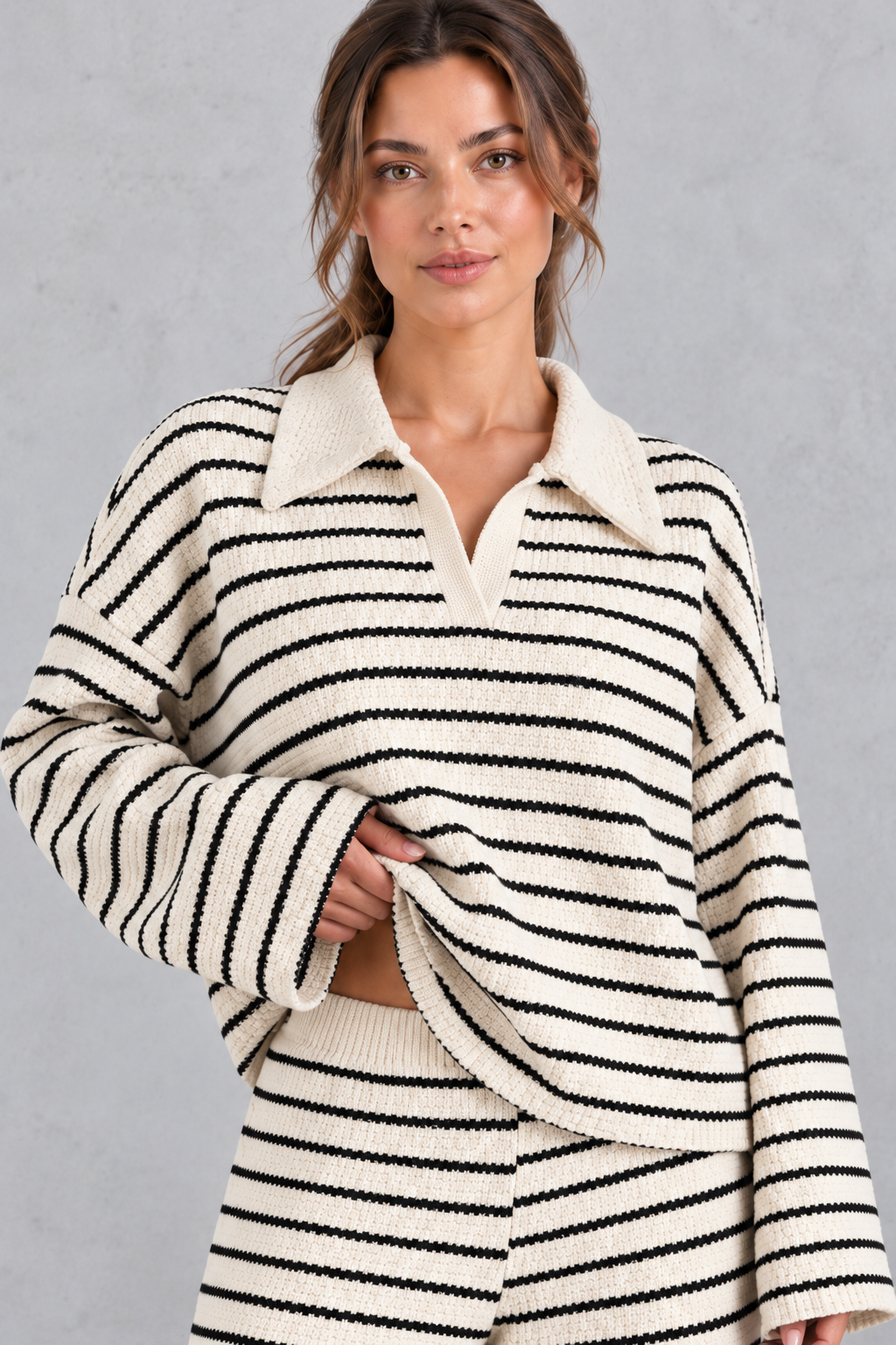 Close-up of the collared V-neckline and textured stripe knit