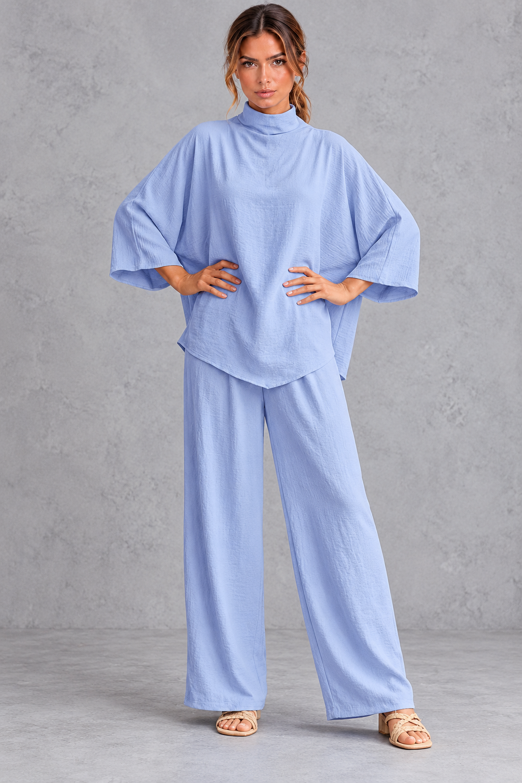 Women's oversized turtleneck blouse and wide leg pants set, front view