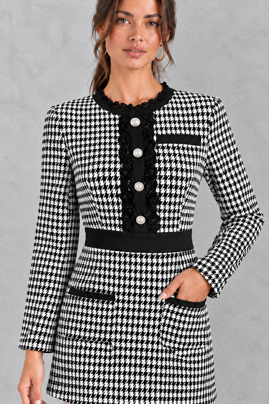 Detail view of a women's tweed mini dress showing delicate lace trim and decorative buttons on a fitted bodycon silhouette.