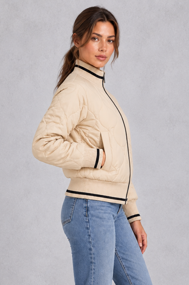 Back view of the quilted bomber jacket with wide ribbed hem