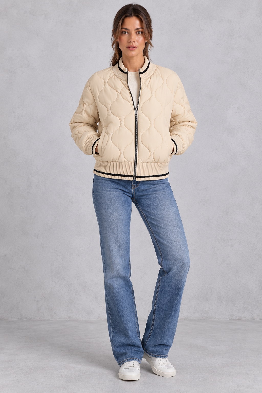 Lightly padded bomber jacket styled with jeans and sneakers