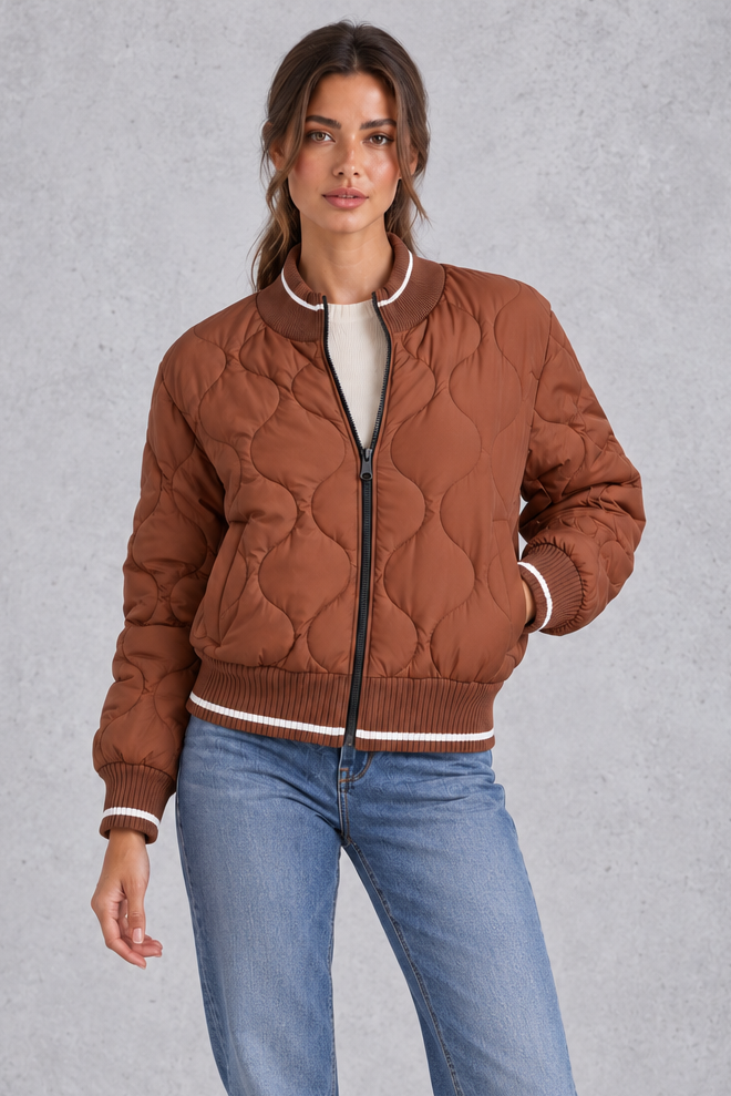Quilted bomber jacket shown in apricot and brown