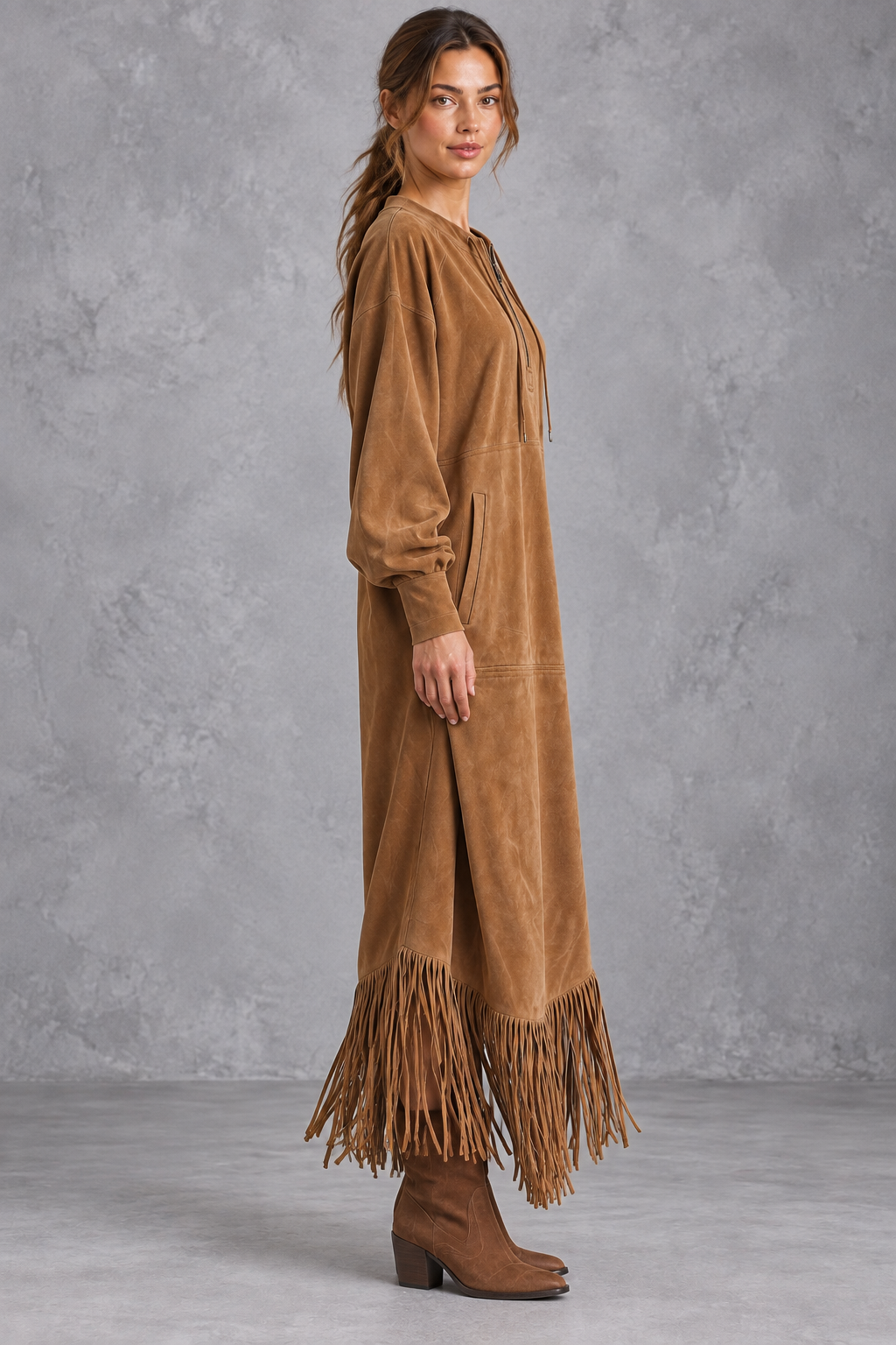 Women's faux suede fringe dress styled with ankle boots for fall
