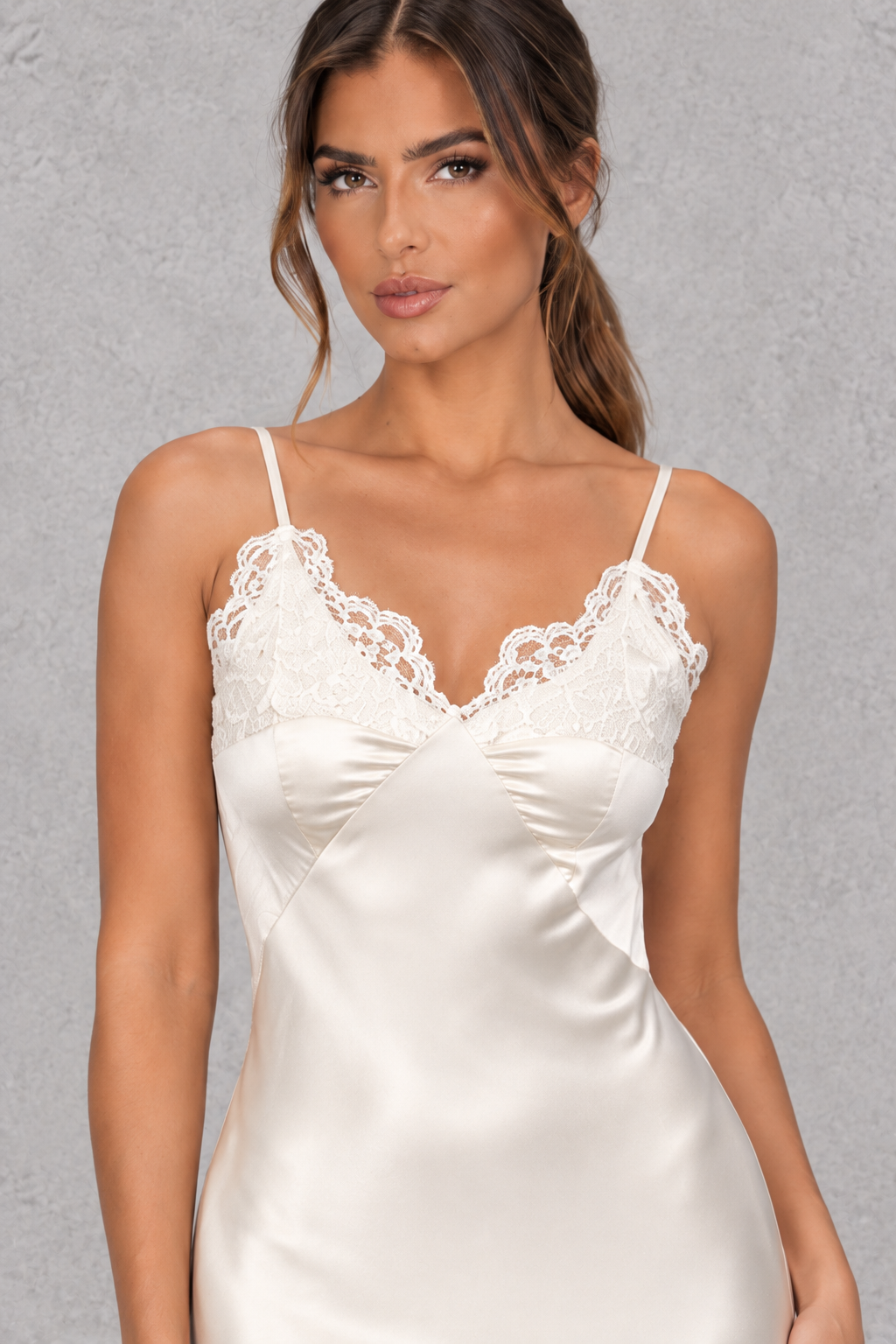 Back view showing the open backless design of a lace maxi dress for a gala.
