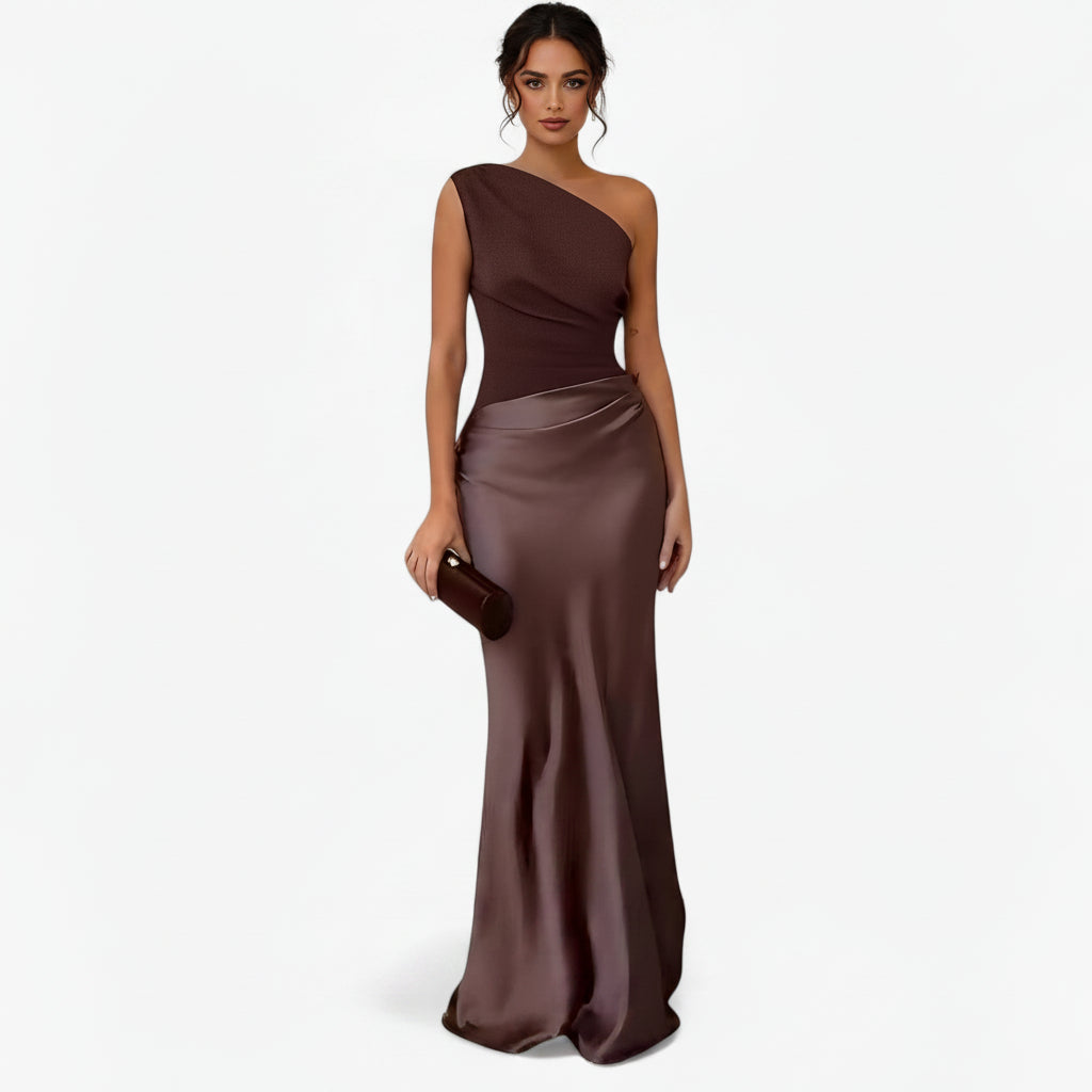 Women's asymmetric maxi dress featuring a flowing silhouette with delicate pleats, lightweight fabric, and an elegant drape. Designed for a flattering fit, this sophisticated dress is ideal for weddings, parties, formal events, and special occasions.