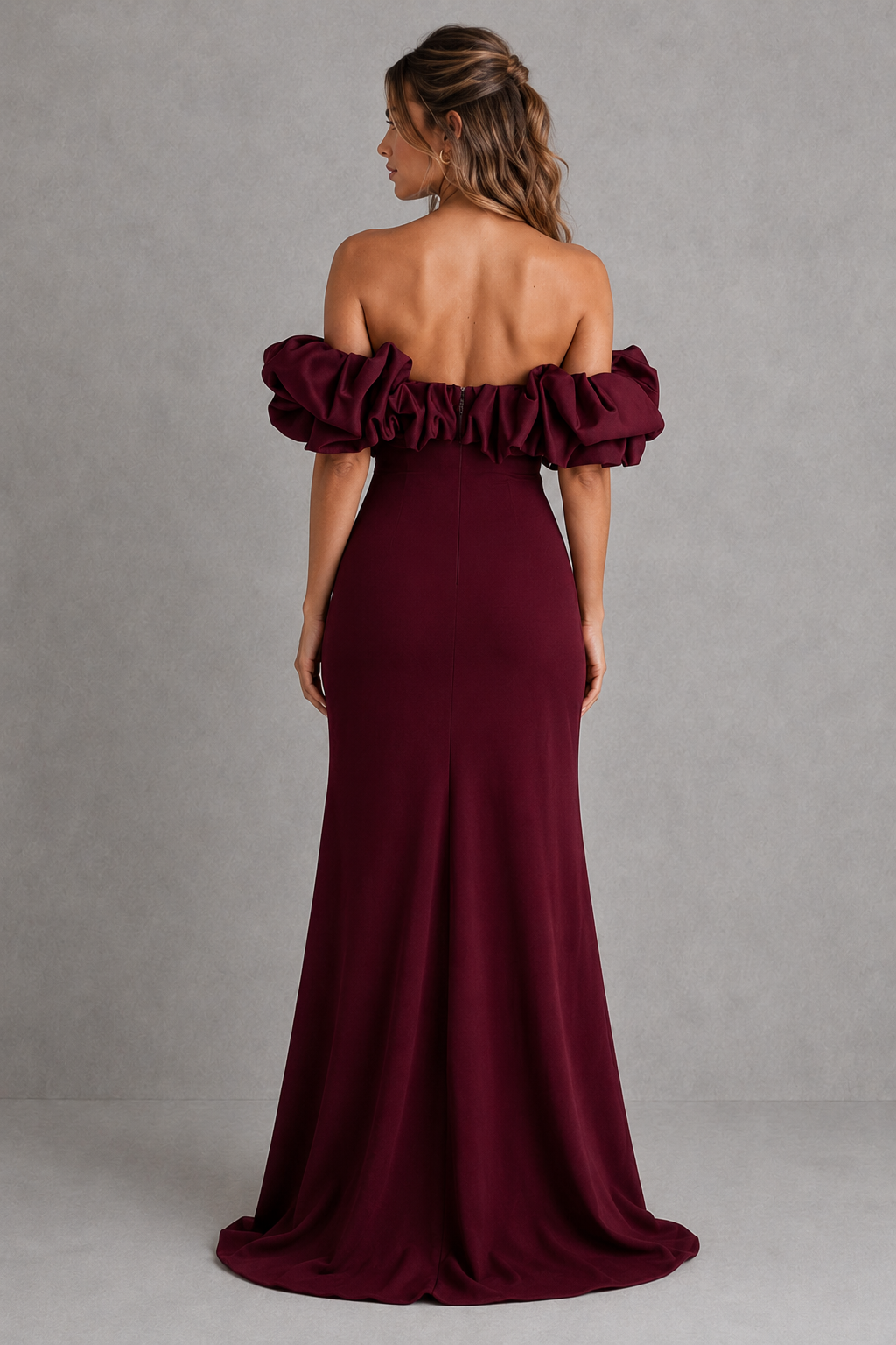 Women's Bardot maxi dress in stretch crepe with a voluminous satin ruffle off-the-shoulder neckline, asymmetrical pleated waist, fitted bodice, draped thigh-high split, and flowing maxi skirt for evening and formal occasions.