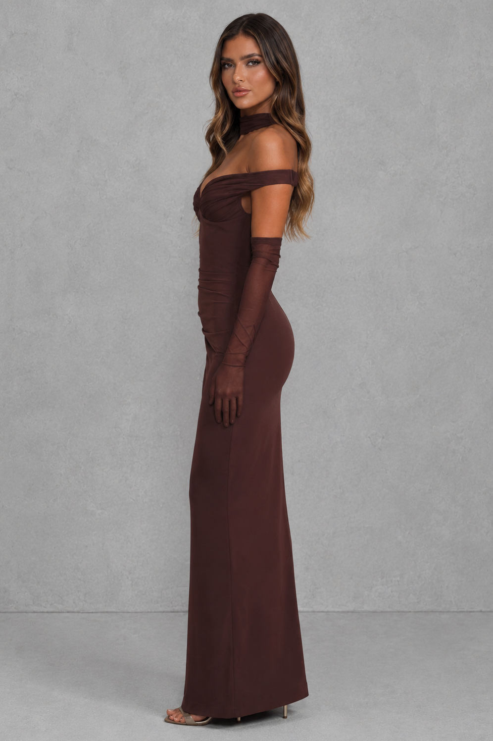 Women's bardot maxi dress in premium non-stretch crepe with a plunge off-the-shoulder neckline, pleated tulle bust detail, asymmetric pleated waist, fitted column silhouette, and centre back split for elegant evening and formal occasions.