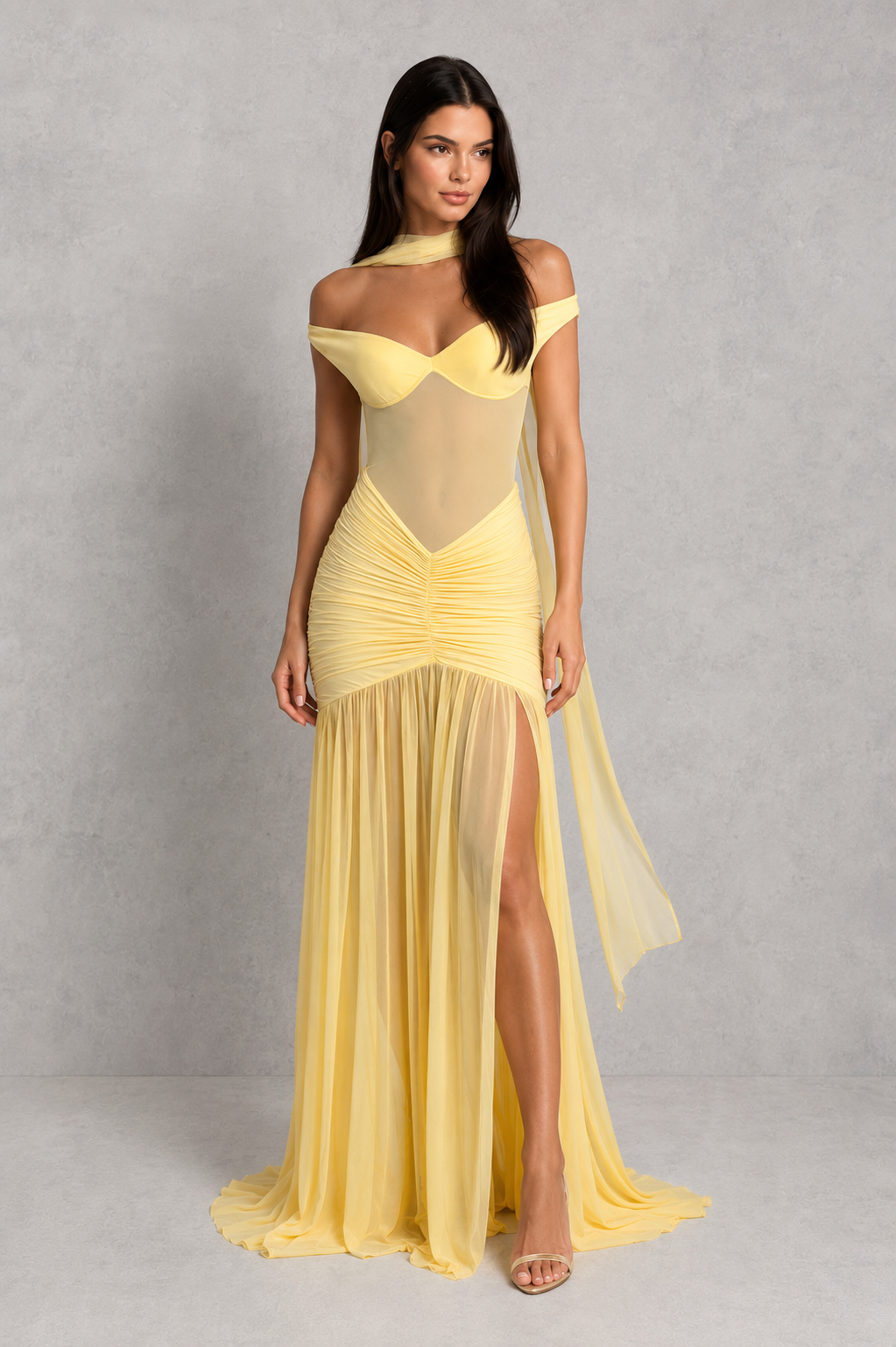 Women's bardot mesh maxi dress with sweetheart neckline, sheer mesh bodice, ruched hips, dropped waist, and dramatic thigh-high split. Elegant fitted evening gown with a flowing maxi skirt for formal events and special occasions.