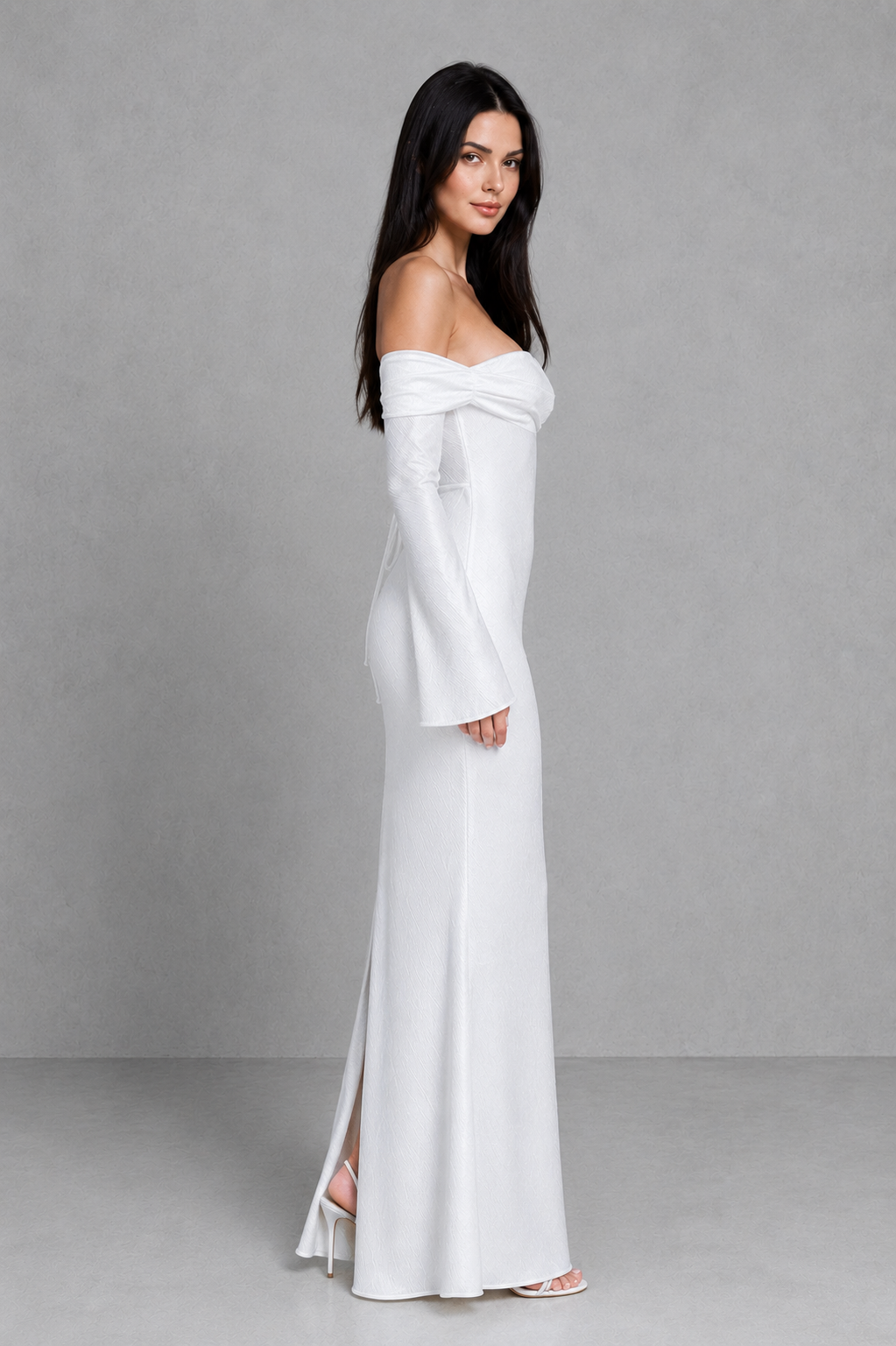 Women's bardot satin maxi dress with twisted off-shoulder neckline, attached waist tie, long flared sleeves, and flowing bias-cut silhouette for elegant evening and formal occasions.