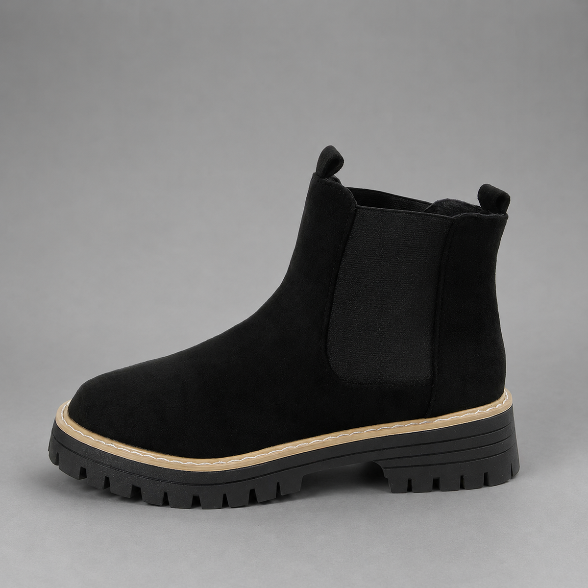 Women’s block heel Chelsea boots with a smooth synthetic leather upper, classic round toe, ankle-high silhouette, and durable rubber outsole.