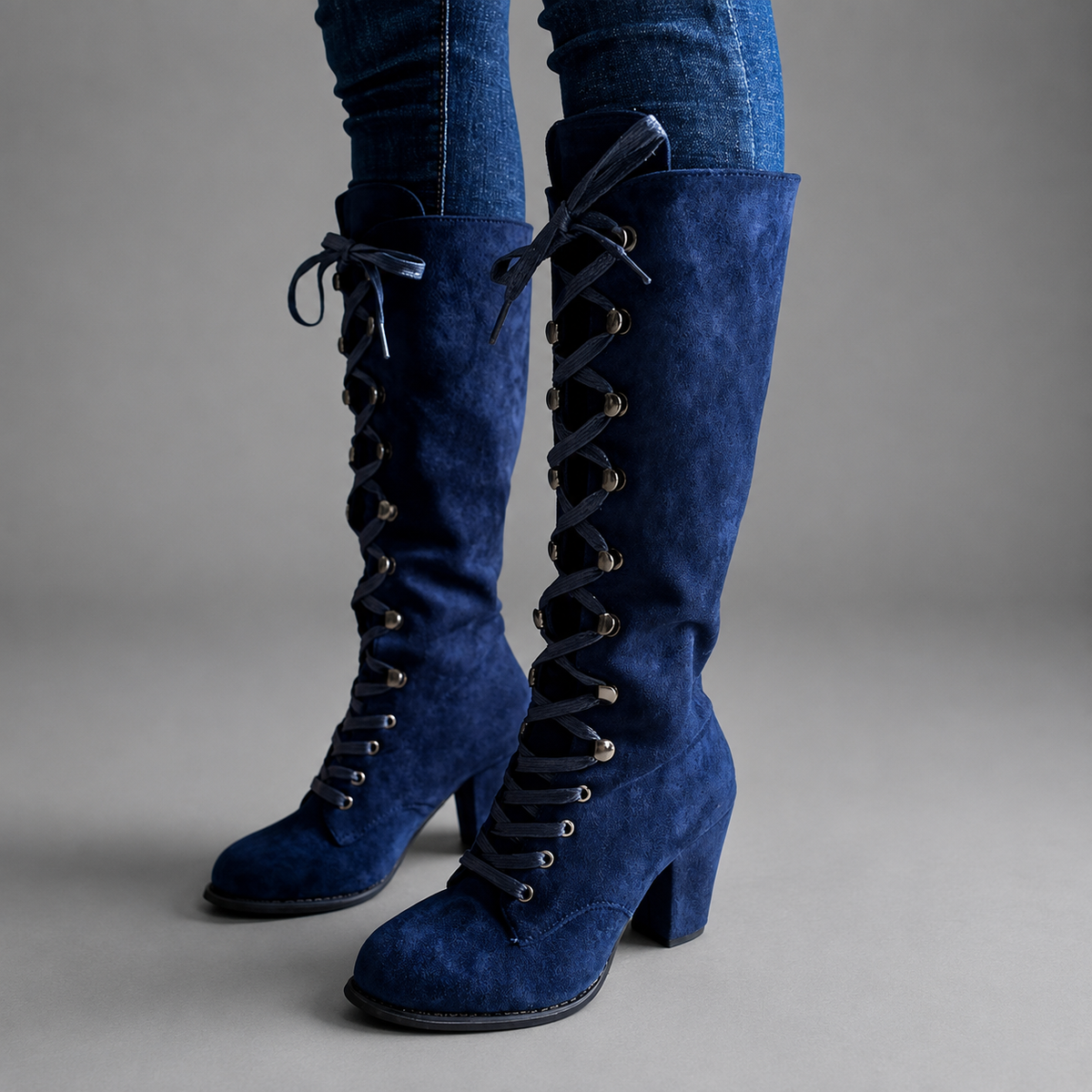 Shop women’s blue lace-up ankle boots with a denim-inspired finish and stable block heel. Stylish casual boots for weekends, concerts and nights out.