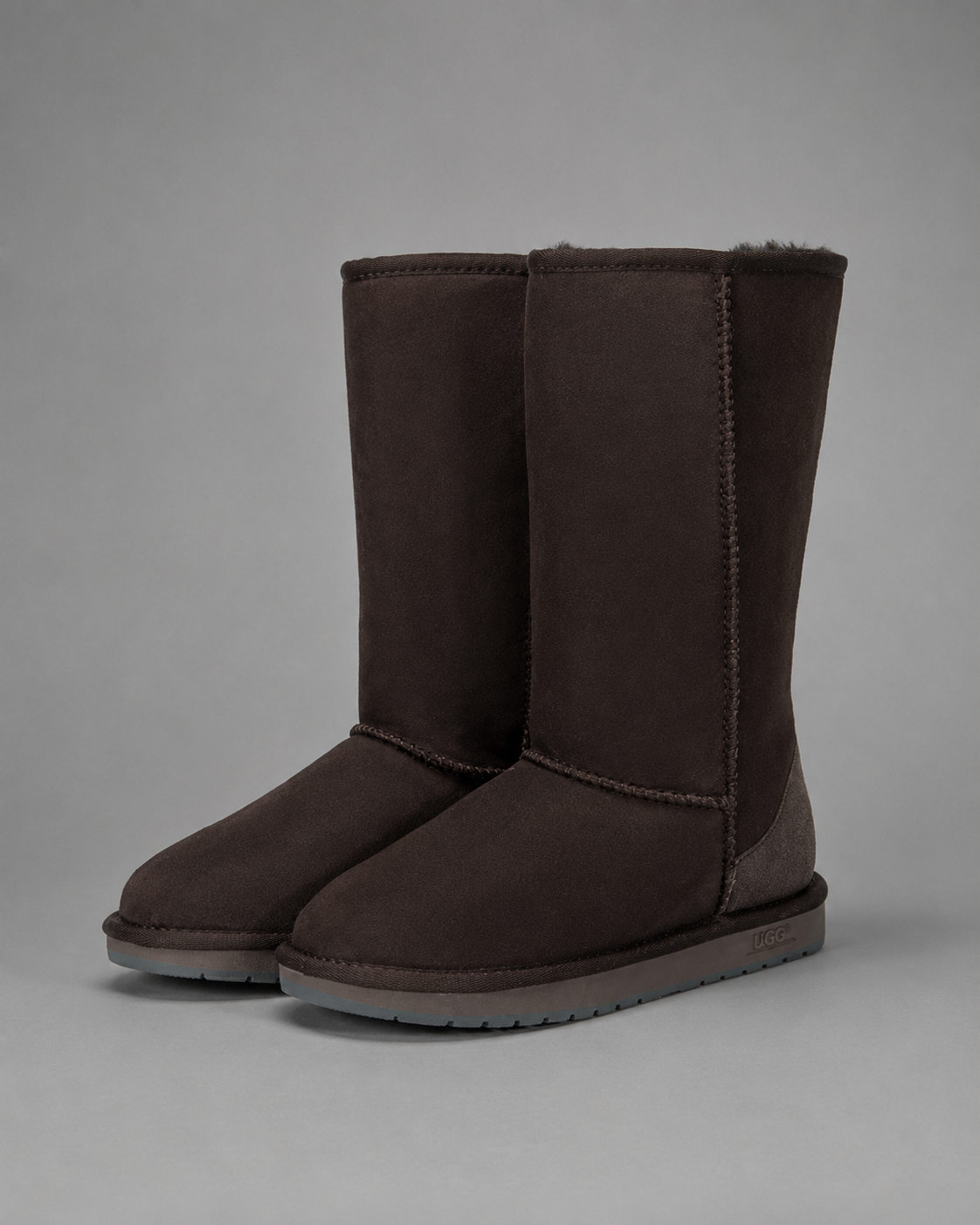 Women’s bow detail mid-calf snow boots with a soft faux fur upper, warm fleece lining, round toe, slip-on design, and flexible rubber sole.