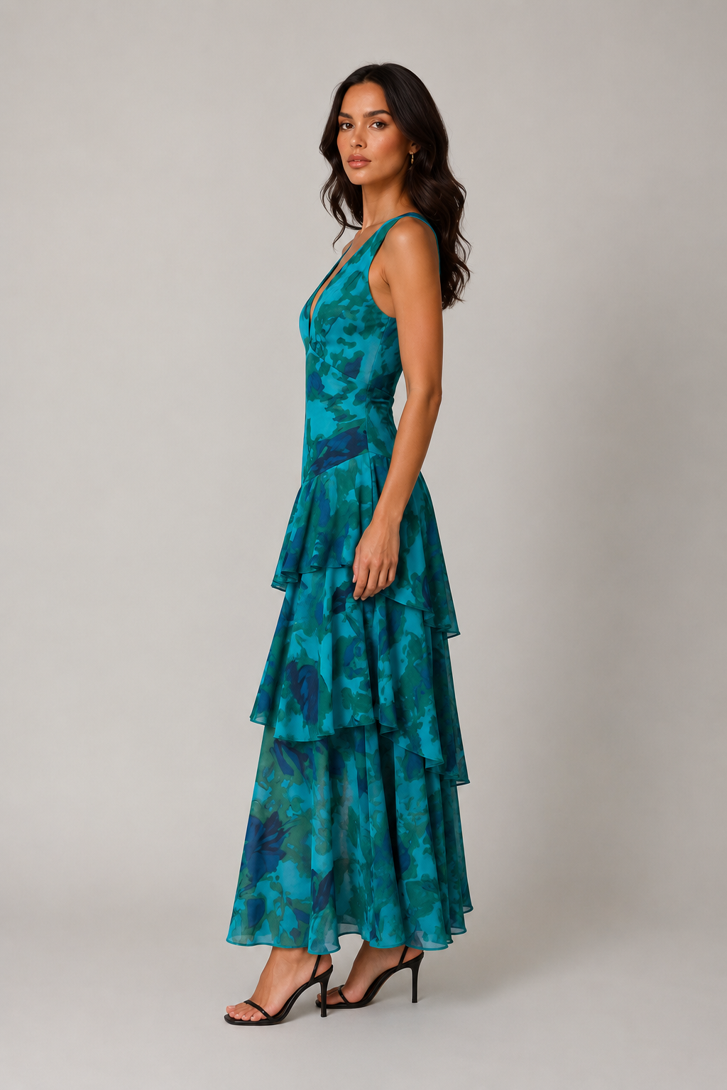 Women's chiffon maxi dress with a V-neckline, tiered ruffle skirt, and flowing silhouette. Lightweight and breathable fabric creates elegant movement, making it suitable for warm-weather events, dinners, and casual outings.