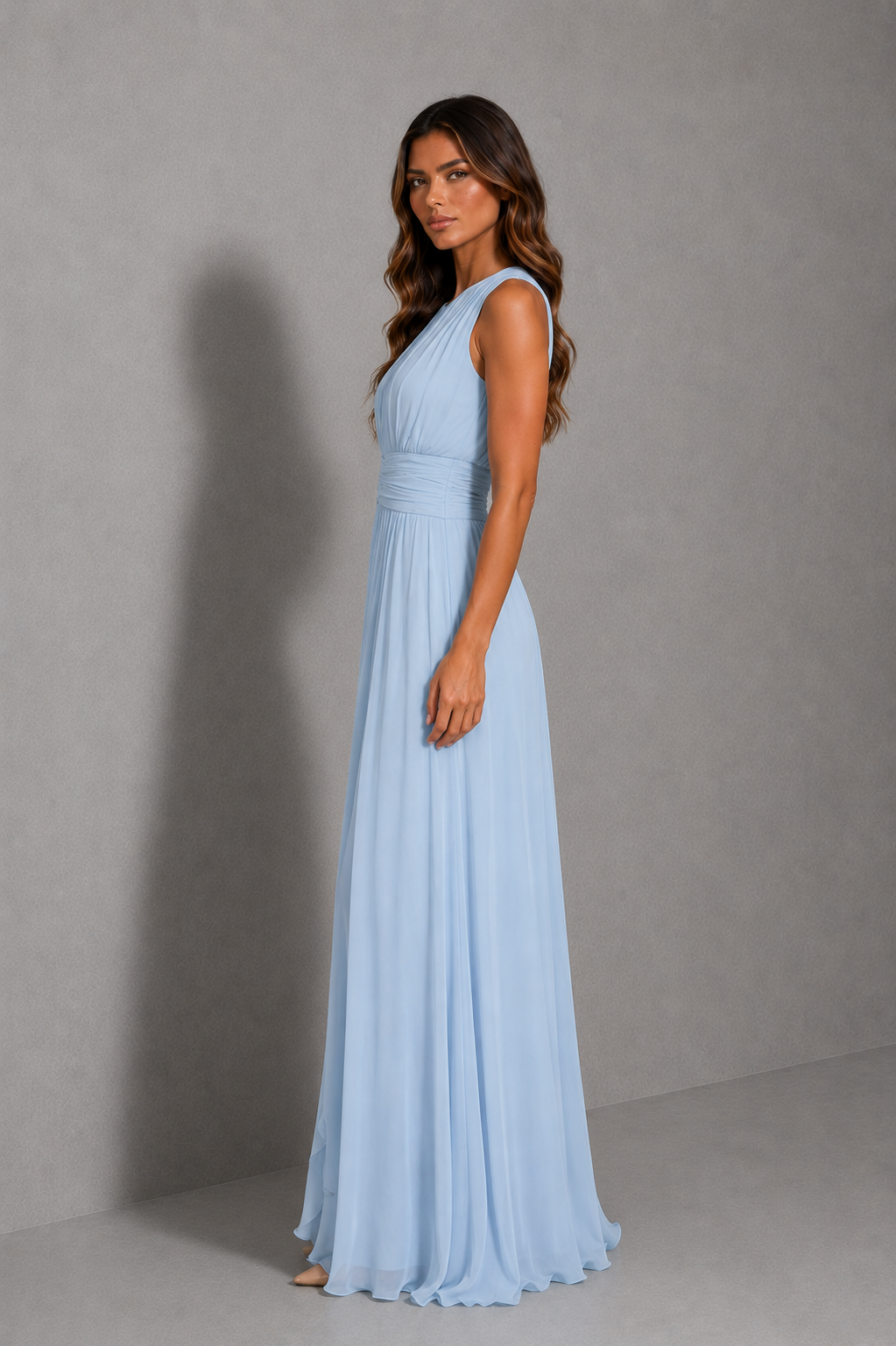 Women’s powder blue chiffon maxi dress with a high neckline, gathered bodice, ruched waist and flowing full-length sleeveless silhouette.