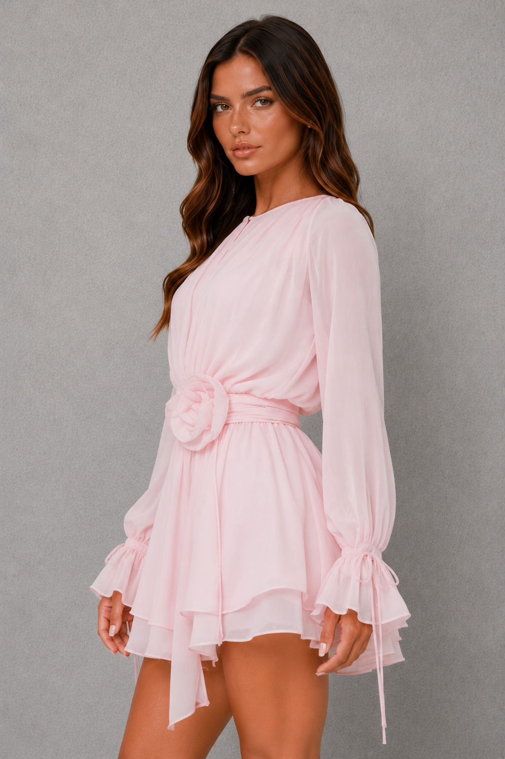 Women's chiffon mini dress with long sheer bishop sleeves, self-tie neckline, removable rosette waist belt, layered skirt, and relaxed fit, ideal for parties, daytime events, and special occasions.