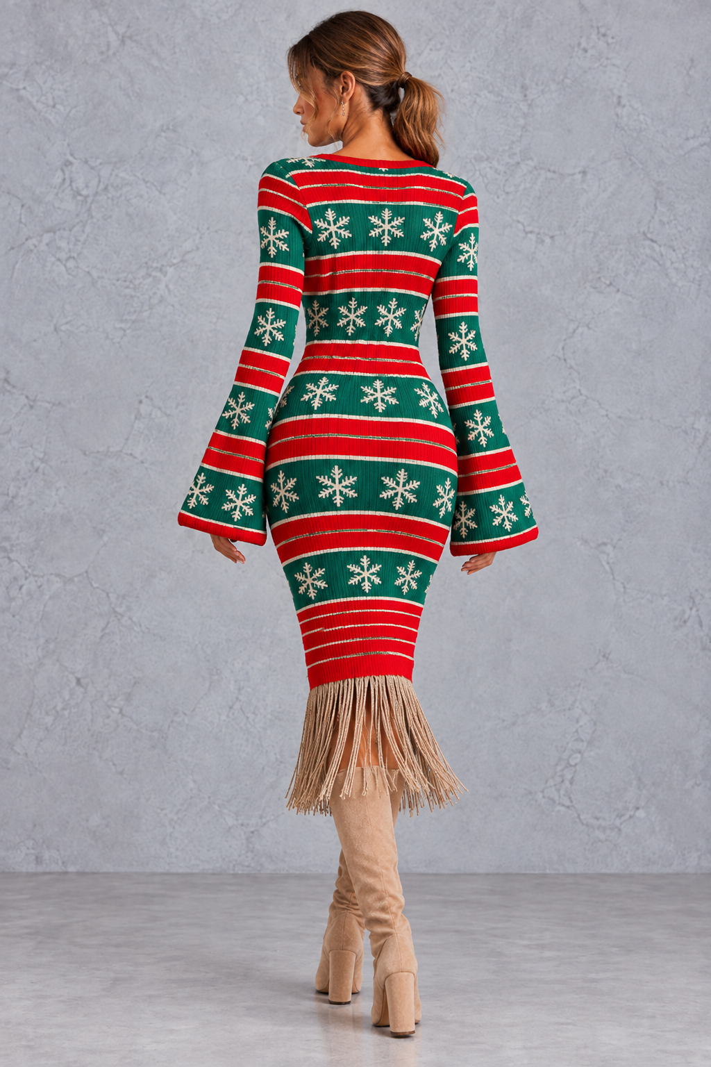 Side view of the body-skimming knit midi dress silhouette