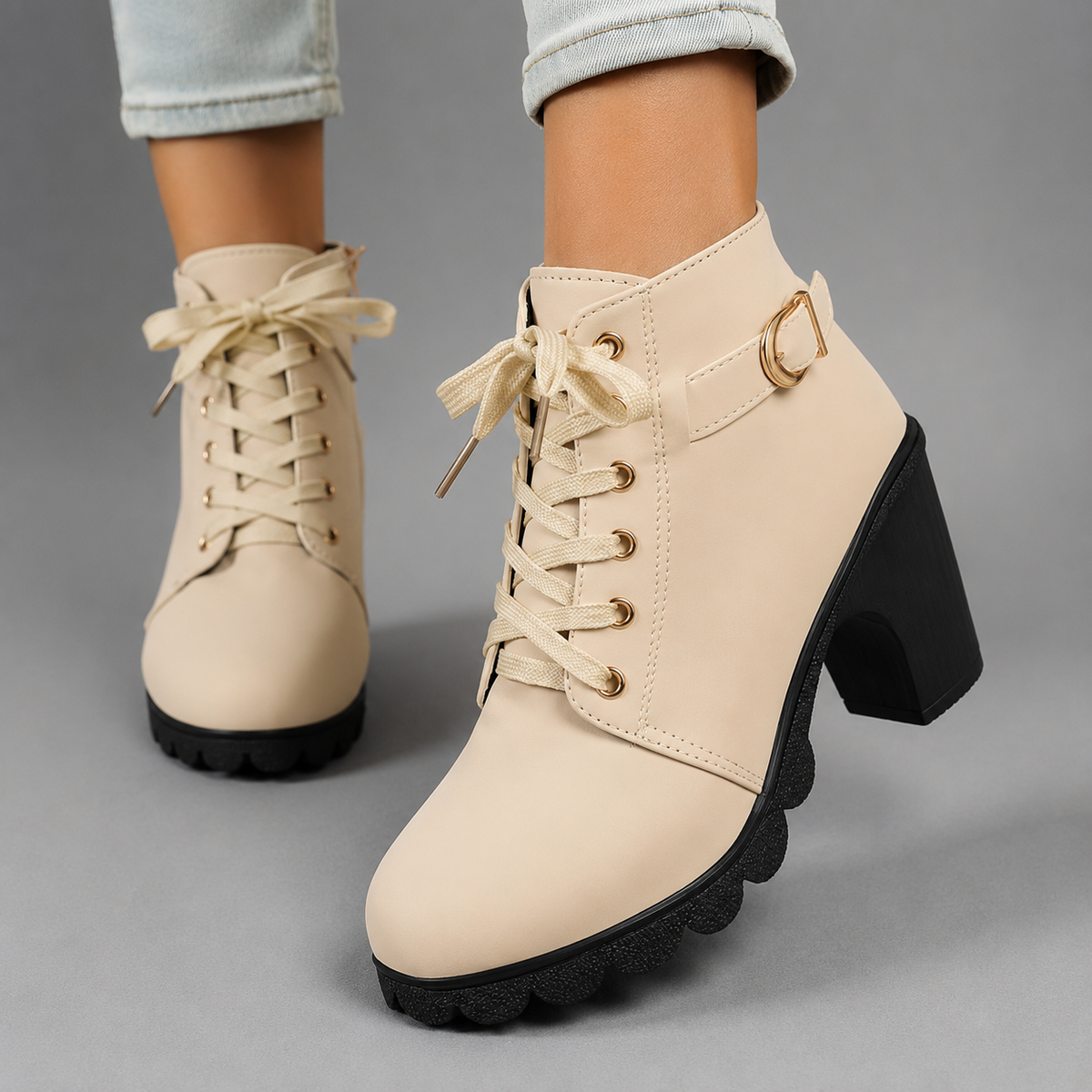 Women’s chunky heel combat ankle boots with an adjustable lace-up front, decorative buckle accents, round toe and durable rubber outsole.