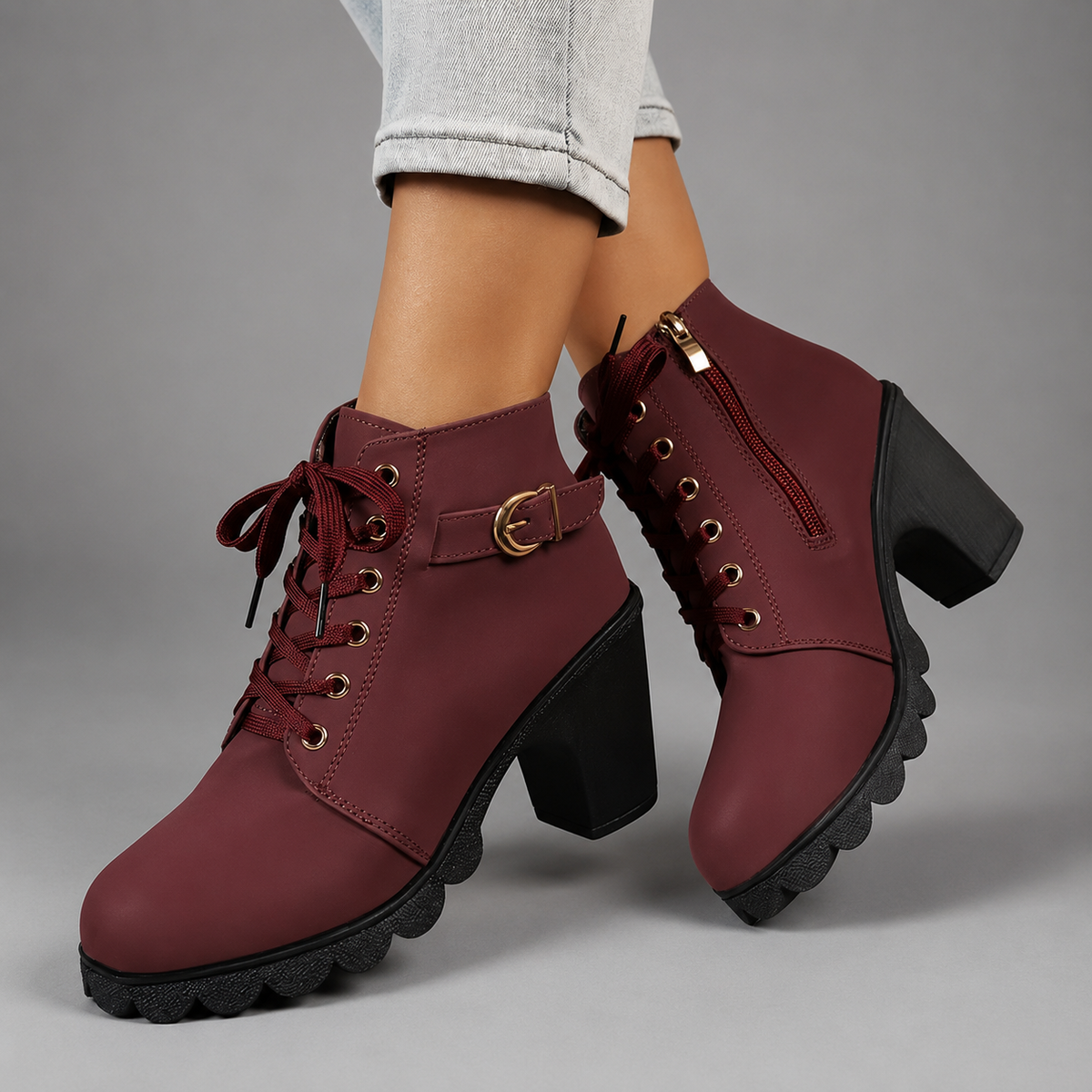 Women’s chunky heel combat ankle boots with an adjustable lace-up front, decorative buckle accents, round toe and durable rubber outsole.