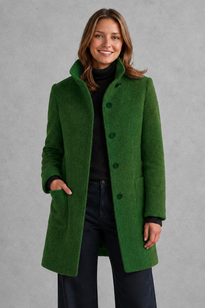 Women’s classic button-front longline coat with a tailored straight silhouette, regular fit and functional side pockets.