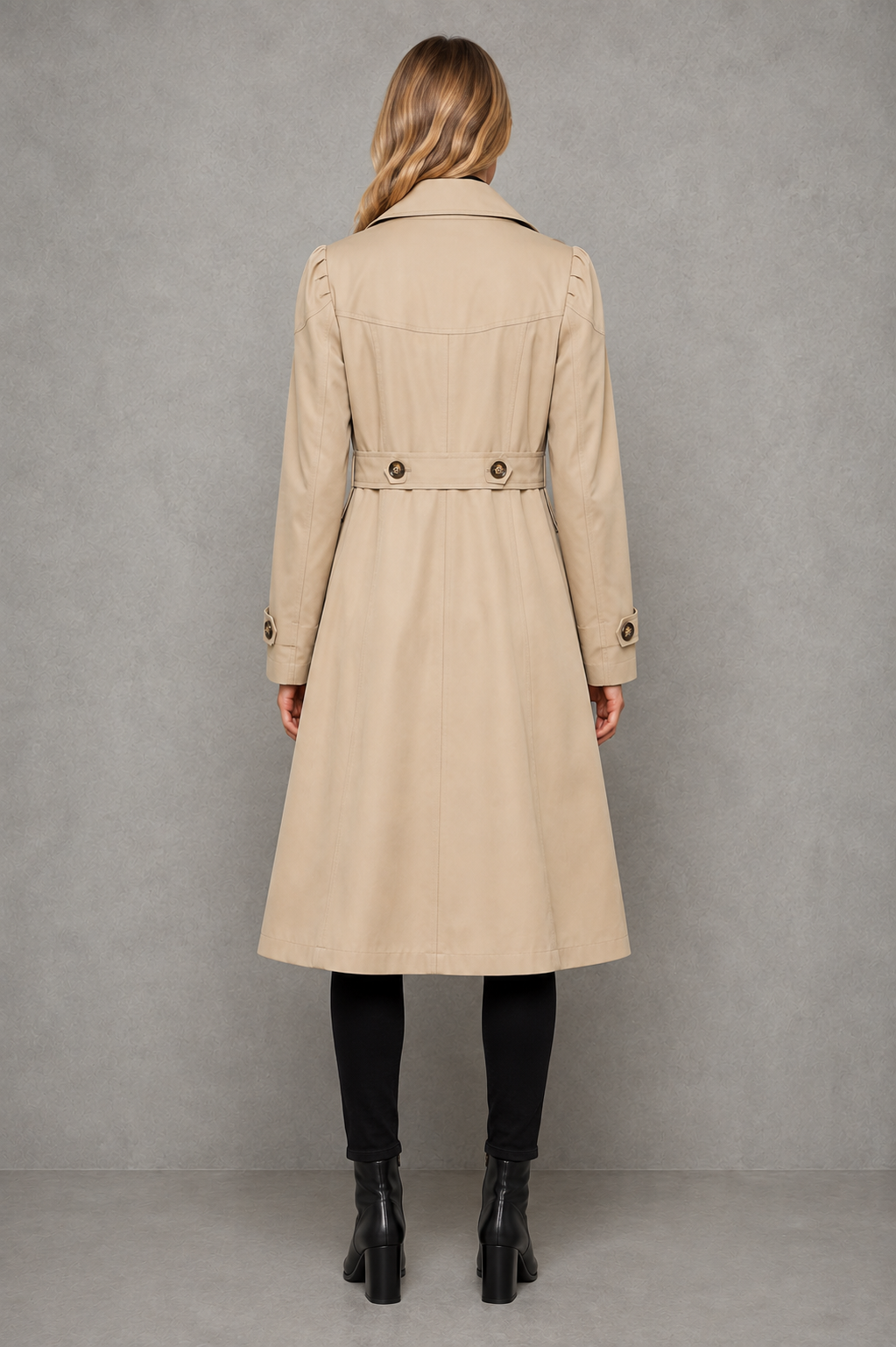 Women’s classic cotton-blend trench coat with a tailored longline silhouette, lapel collar, button-front closure, and functional side pockets.