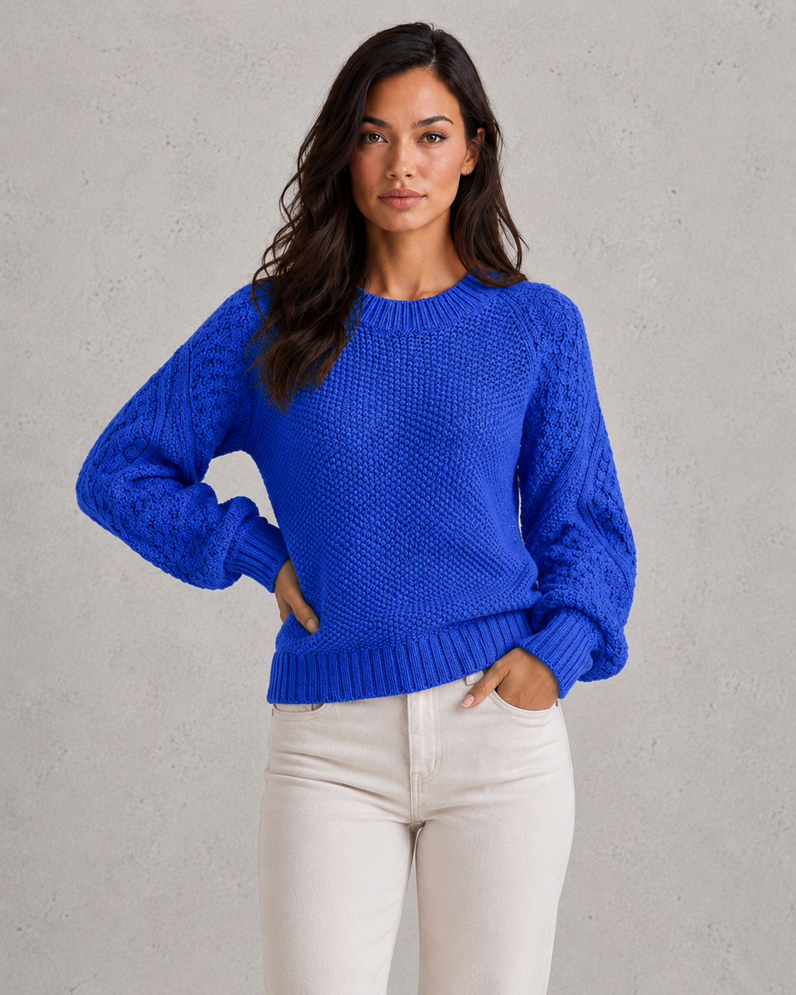 Women's classic knit sweater in soft wool-look fabric with crew neckline, long sleeves, and relaxed fit for elegant autumn and winter styling.