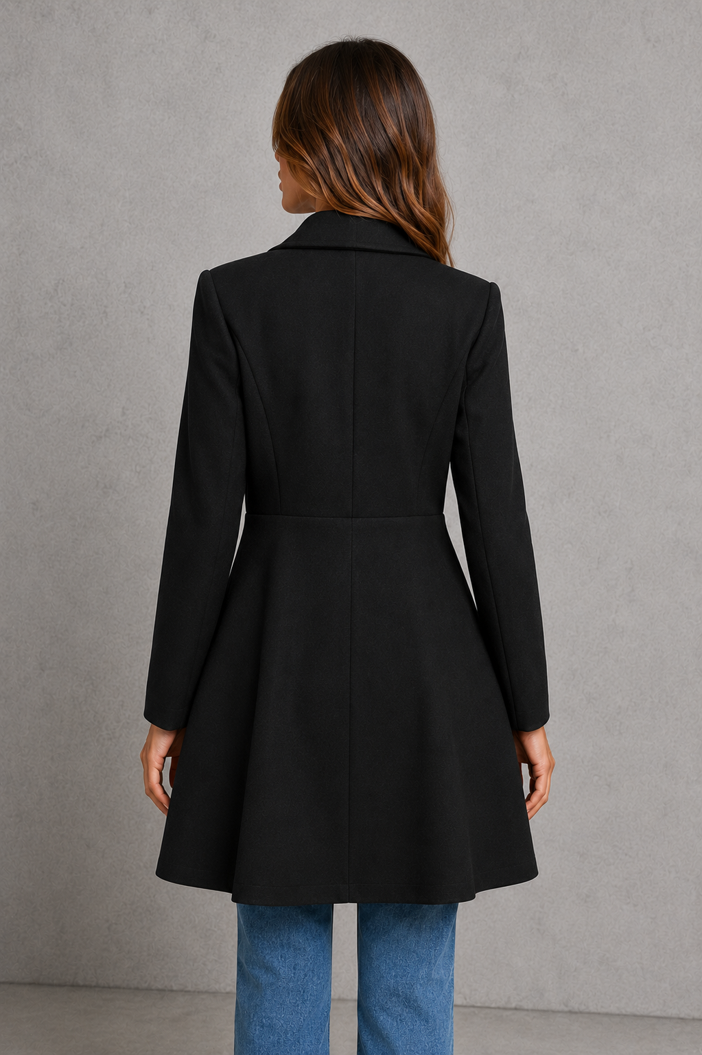 Women’s classic longline overcoat with a tailored silhouette, timeless lapel collar and elegant streamlined design for polished cold-weather layering.