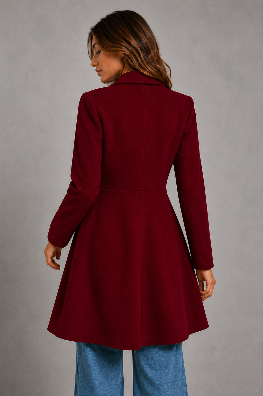 Women’s classic longline overcoat with a tailored silhouette, timeless lapel collar and elegant streamlined design for polished cold-weather layering.
