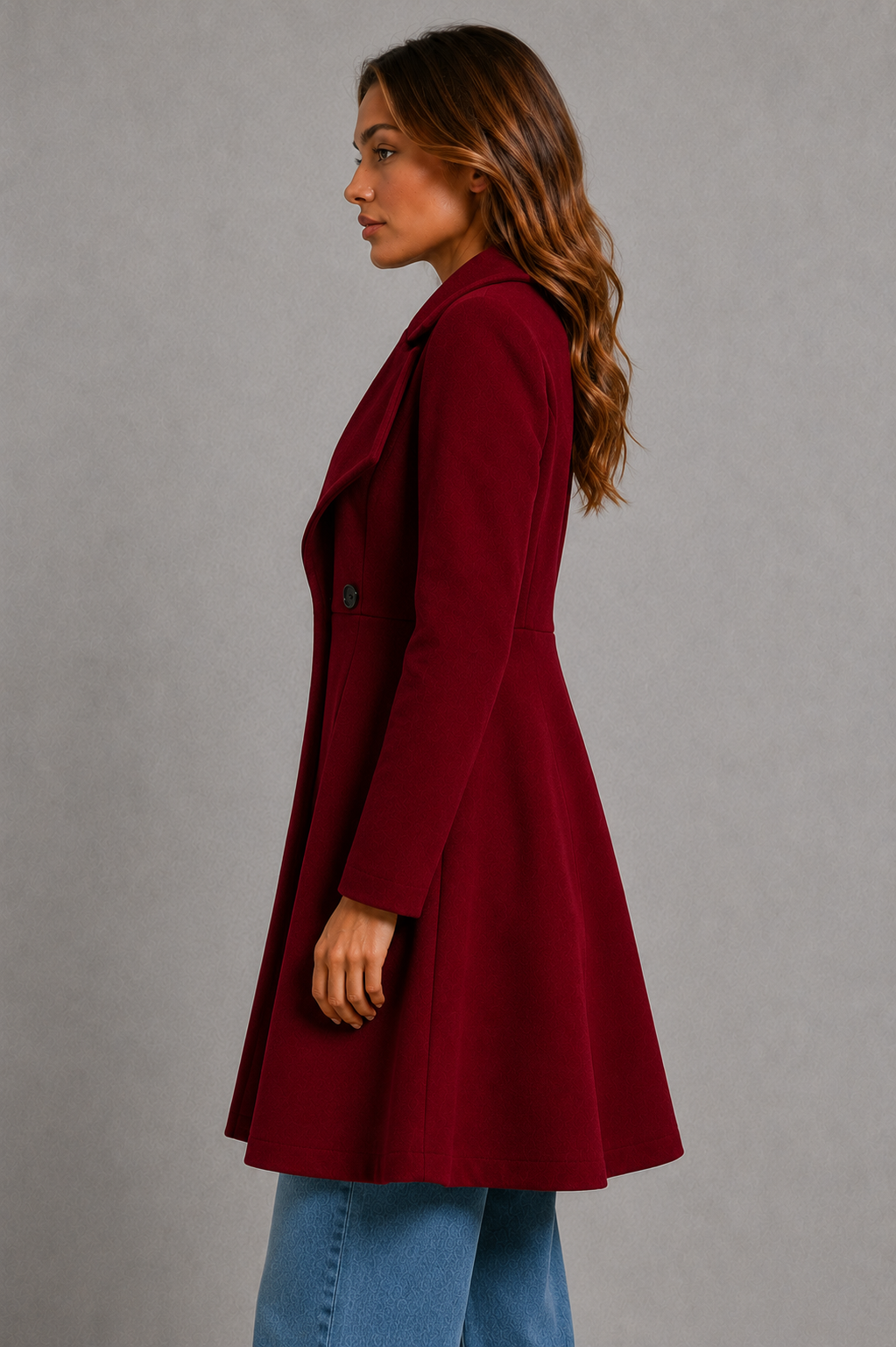Women’s classic longline overcoat with a tailored silhouette, timeless lapel collar and elegant streamlined design for polished cold-weather layering.