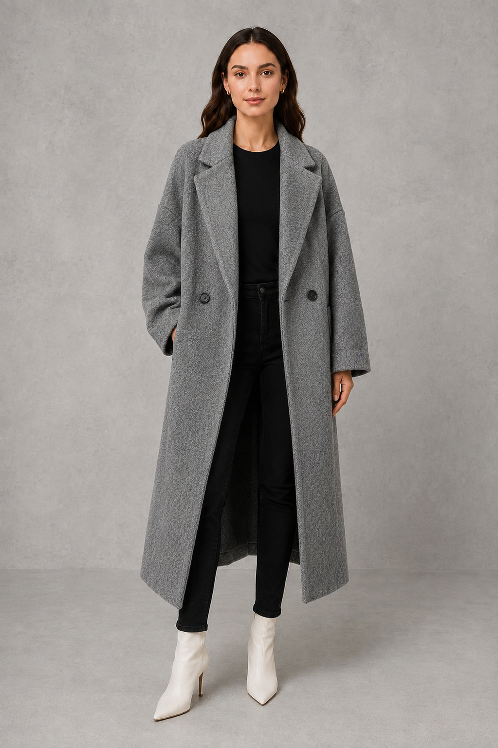 Women’s classic wool maxi coat with a relaxed longline silhouette, traditional button-front closure and clean minimalist finish.